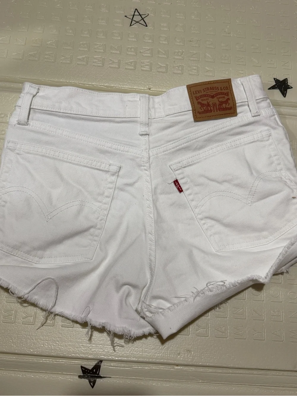 Levi's White Distressed Frayed Hem Denim Shorts